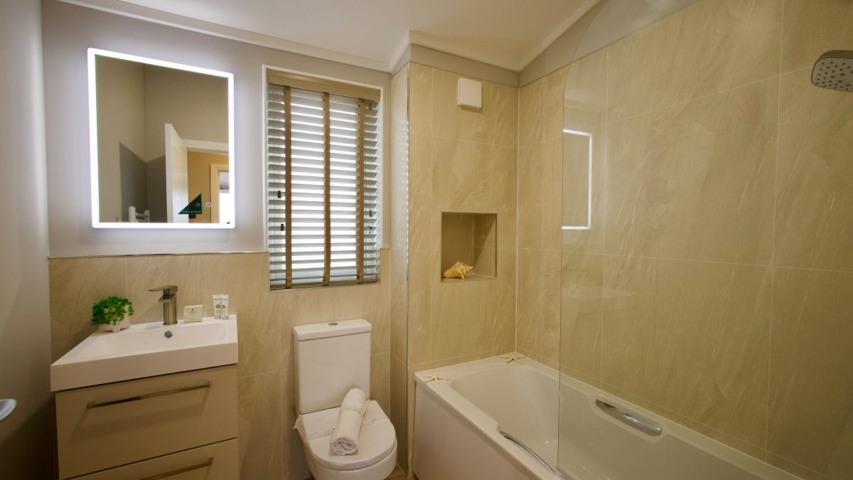 Modern guest bathroom in the Harbur H3 Home bespoke park home