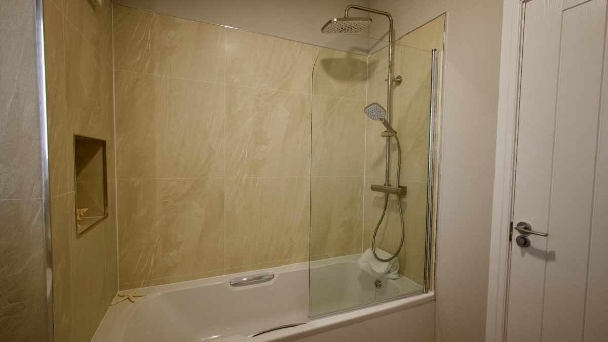 Modern guest bathroom in the Harbur H3 Home bespoke park home